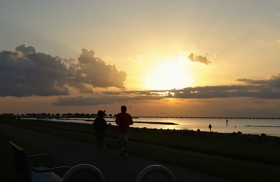 Lakefront run at sunset, New Orleans, Louisiana, USA