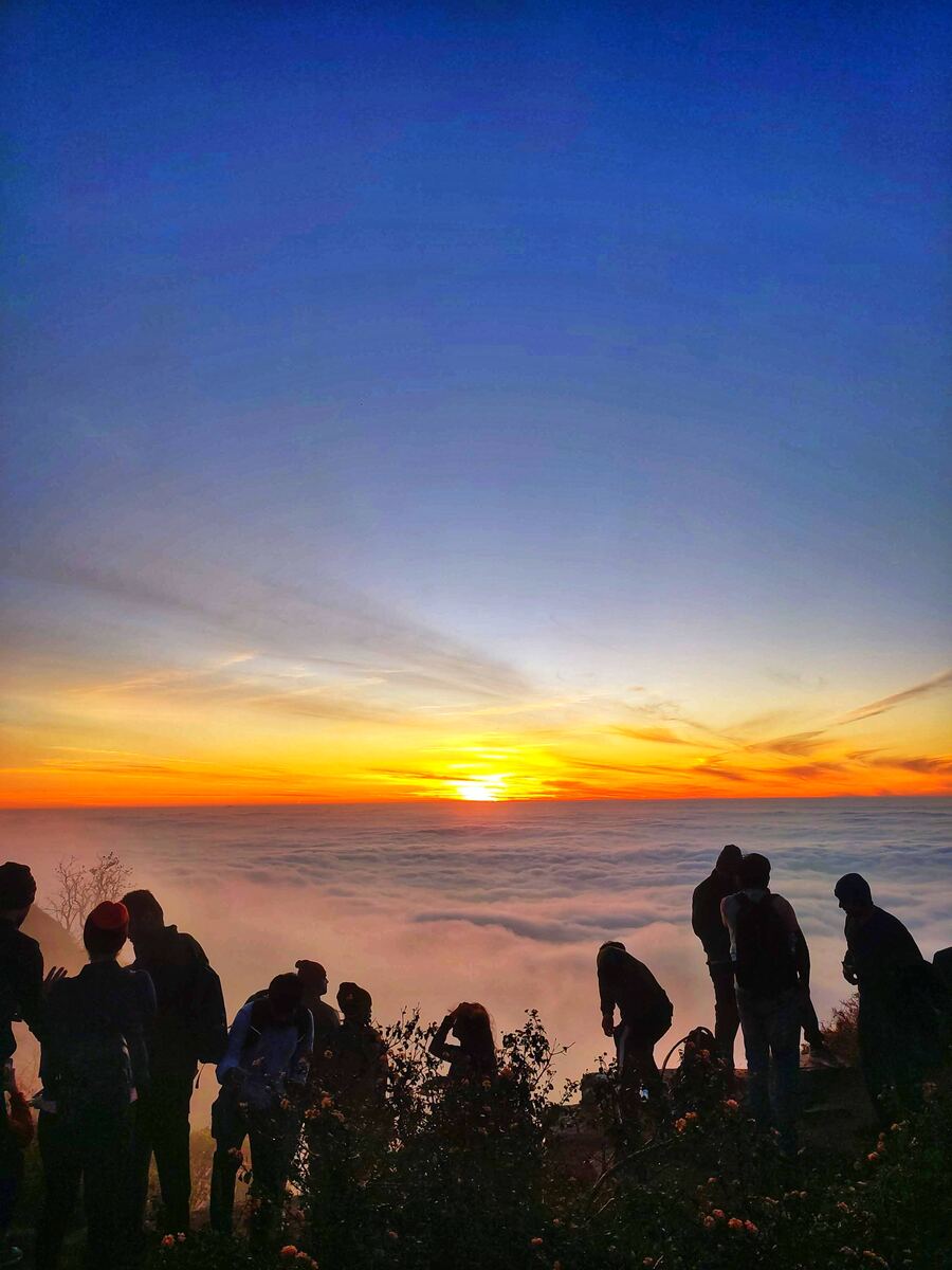Sunrise over a sea of clouds, Nandi Hills, Karnataka, India